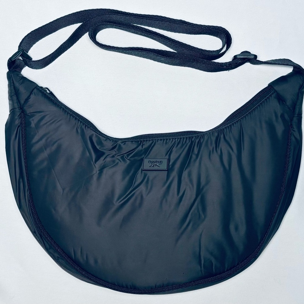 Reebok Crescent Shape Puffy Crossbody Sling Bag Black Adjustable Strap Zip NEW